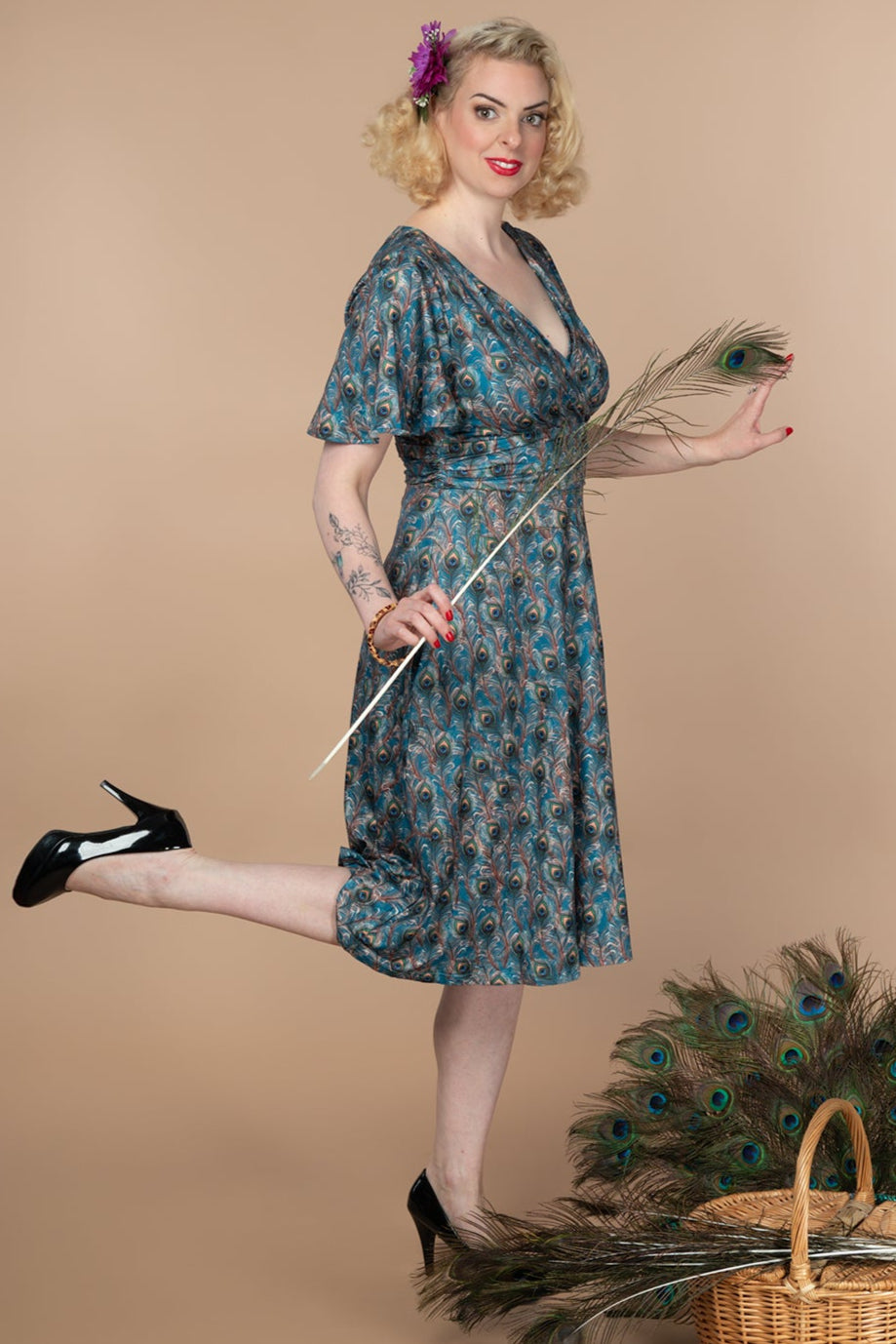 Donna Cross Over Bust Flared Dress in Peacock Feather Print