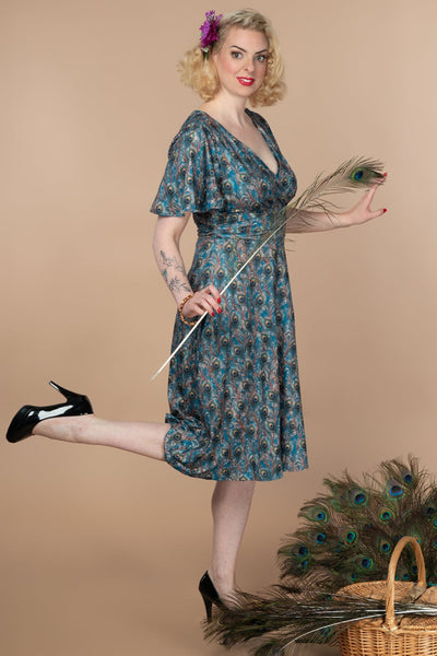 Donna Cross Over Bust Flared Dress in Peacock Feather Print