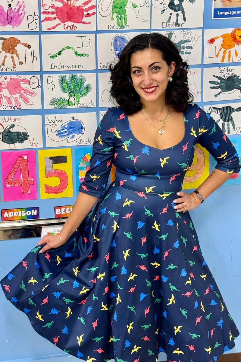 Scarlette Long-Sleeved Stretchy Dress in Navy and Colourful Dino Print