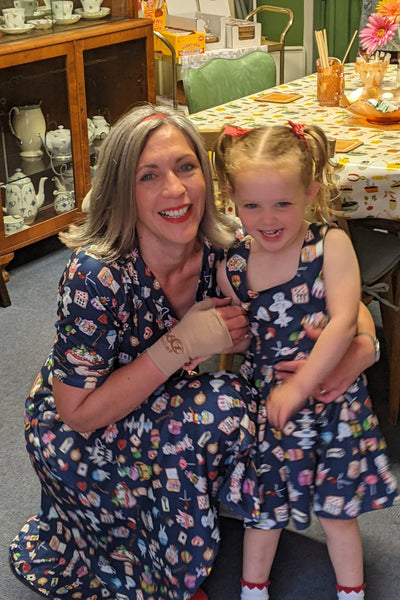 Children Amanda Swing Dress in Navy Blue Wonderland Print