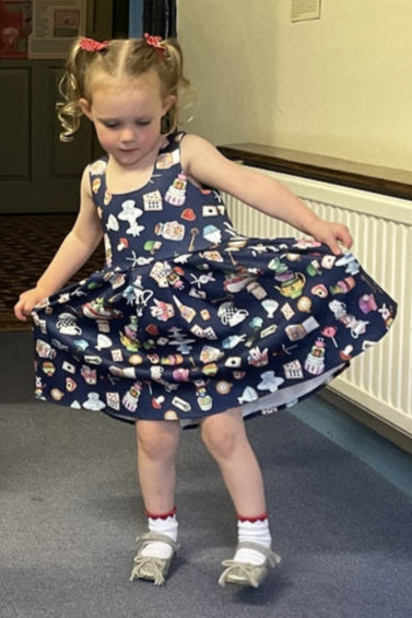 Children Amanda Swing Dress in Navy Blue Wonderland Print