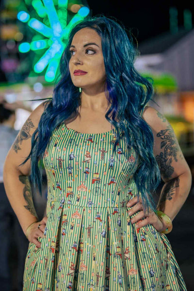 A lady wearing a Green Circus Striped Flared Dress