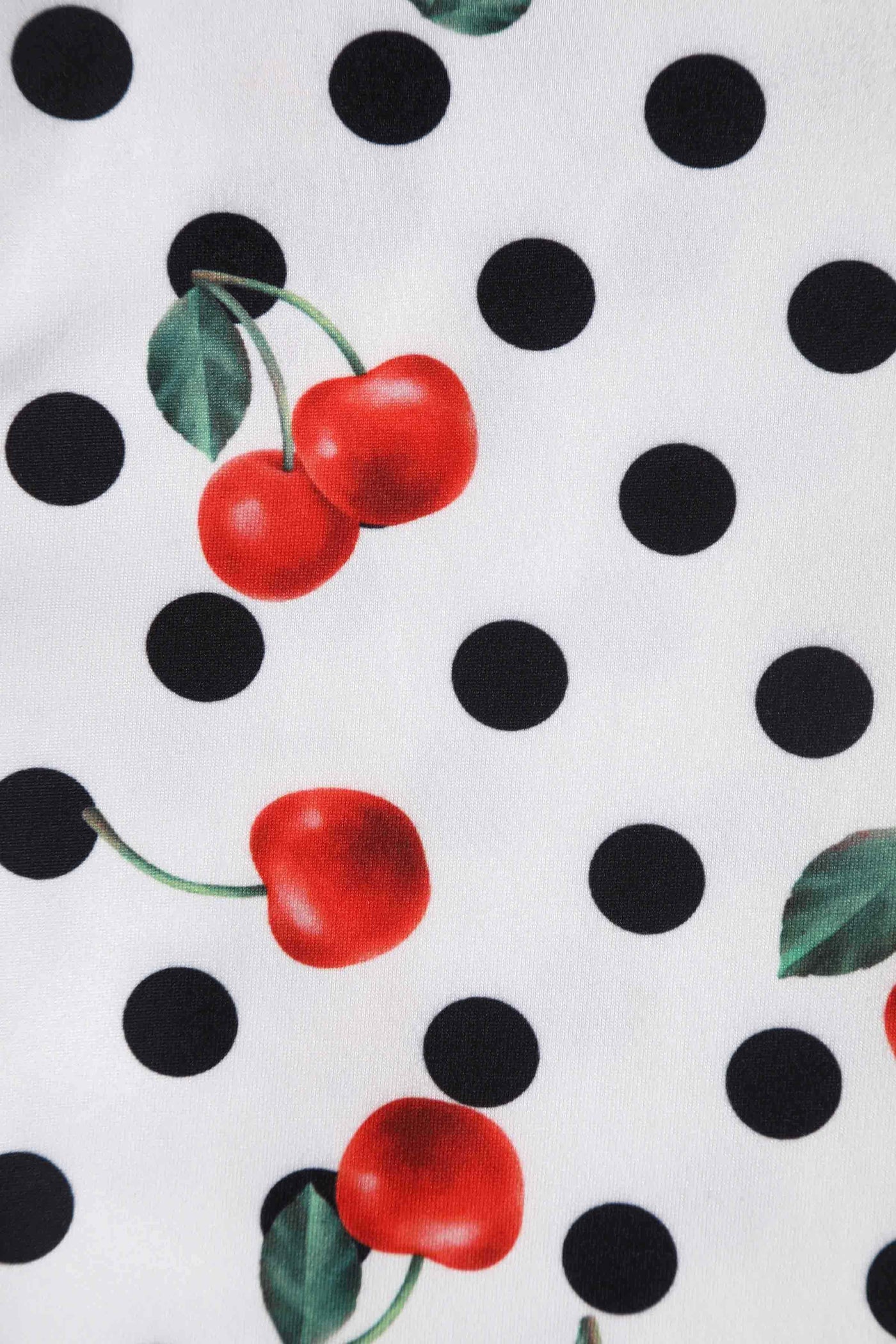 Close up view of Retro Cherry and  Polka Dot Print Dress in white