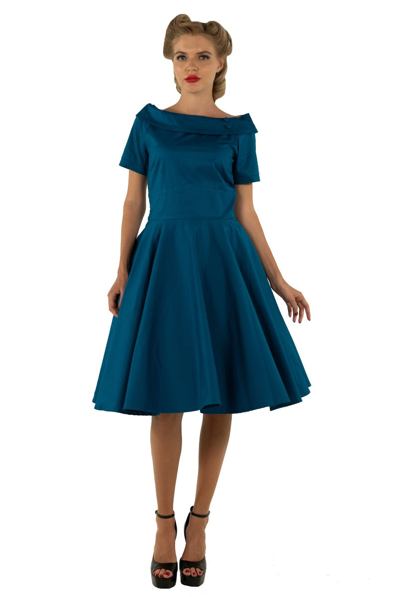 Vintage-inspired Peacock Blue Swing dress with pockets and sleeves
