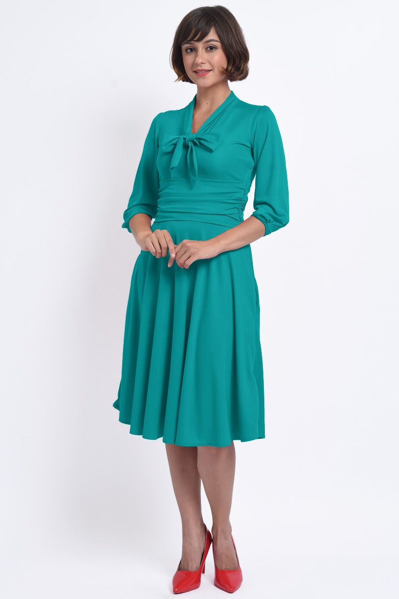 Sandra Vintage Inspired Stretchy Turquoise Bow Tie Dress