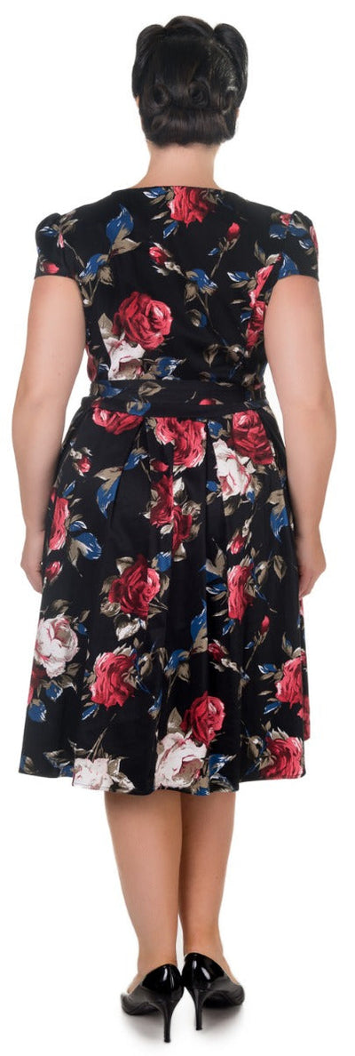 Vintage-inspired Floral Swing Dress in Black with sleeves and pockets
