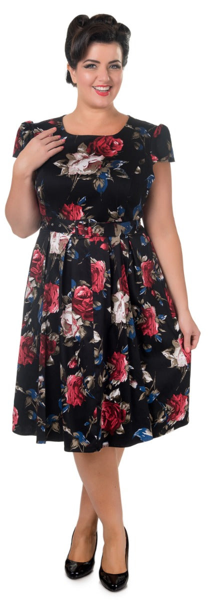 Vintage-inspired Floral Swing Dress in Black with sleeves and pockets
