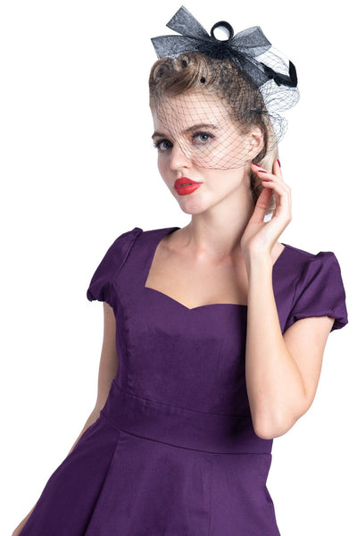 Woman's Flirty Fifties Style Dress in Plain Purple1